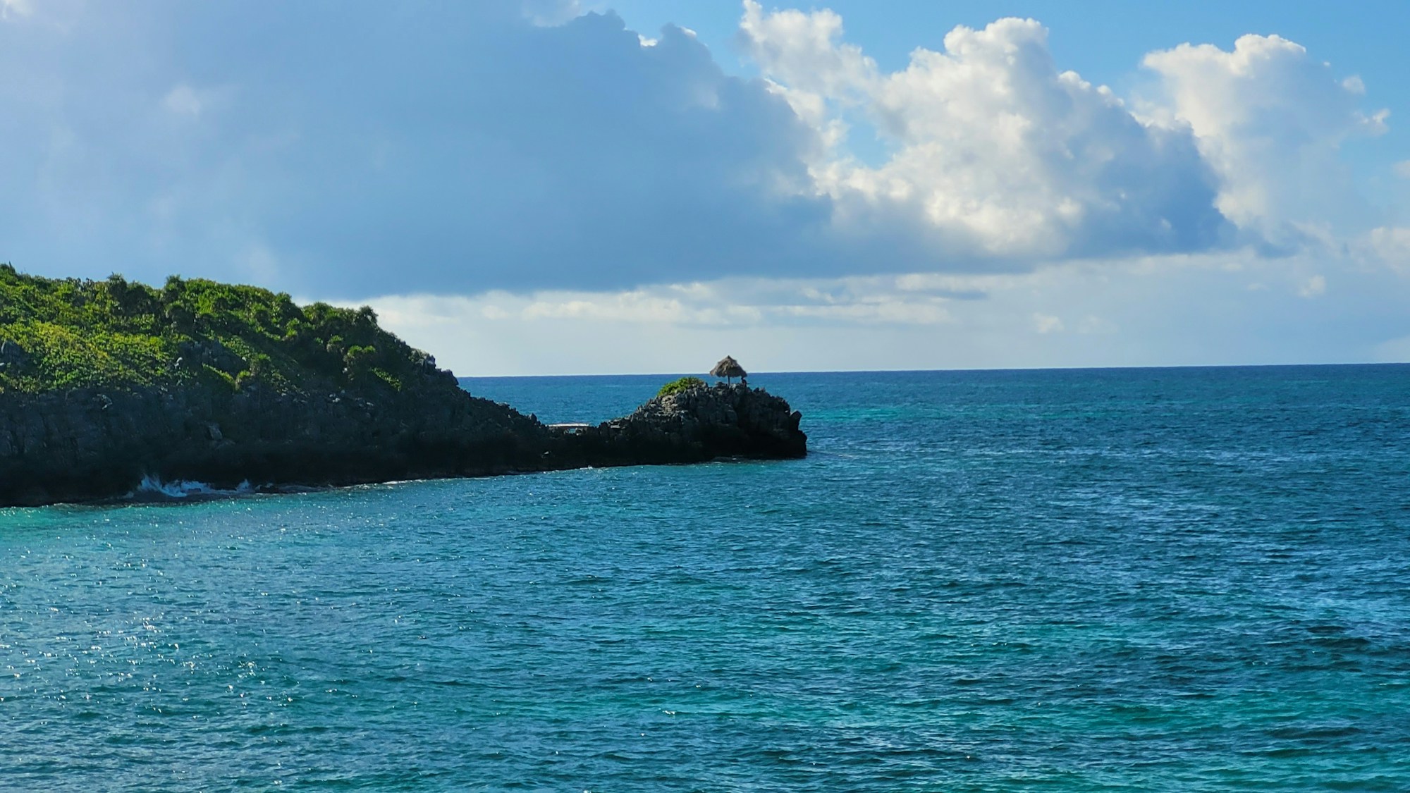 Roatan Paya Bay tropical shoreline with calm water