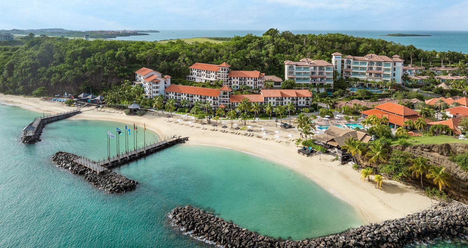 Couples browsing duty-free jewelry options in a Caribbean boutique