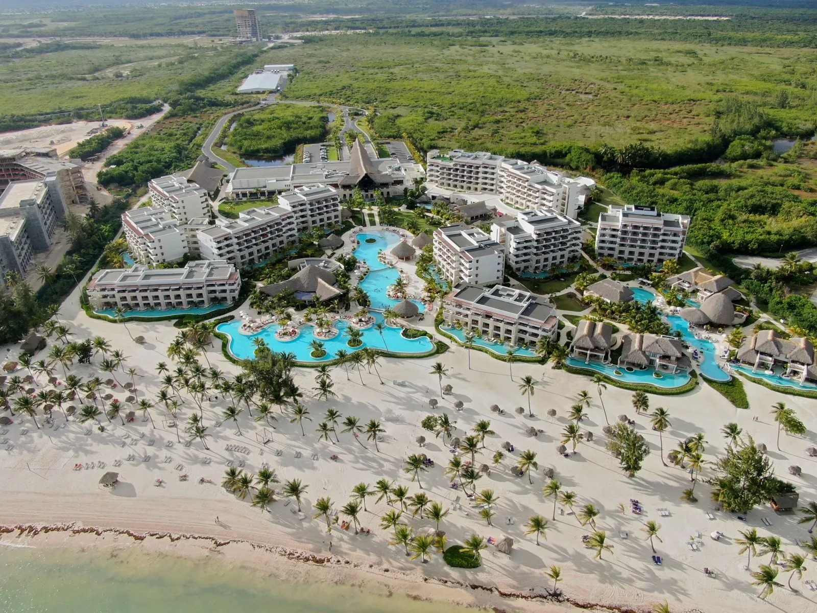 Sandals Royal Bahamian's Barefoot Cay with morning light and empty cabanas