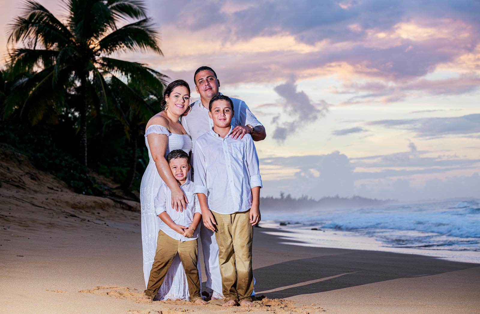Family enjoying beach resort with palm trees and turquoise water